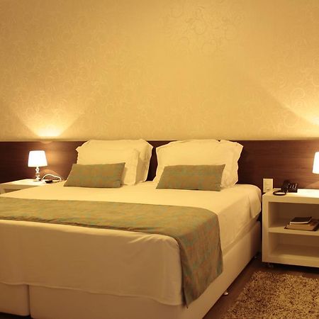 Hz Hotel Патус-ди-Минас Экстерьер фото